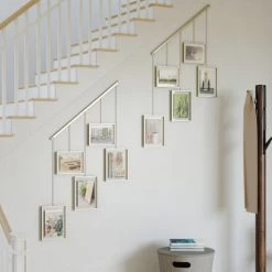 Umbra Cadres Et Albums Photos Porte Photos Mural Pour 5 Cadres, Métal Doré -Décoration de porte Soldes porte photos mural pour 5 cadres metal dore 3